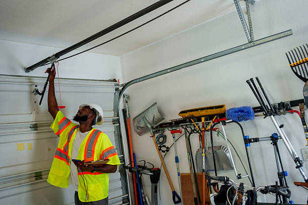 Professional Garage Door Panel Replacement technician working in Barview, OR